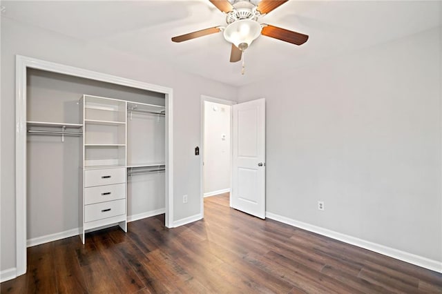 unfurnished bedroom featuring a ceiling fan, wood finished floors, a closet, and baseboards