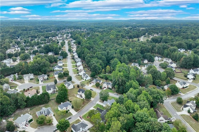 aerial view with a forest view and a residential view