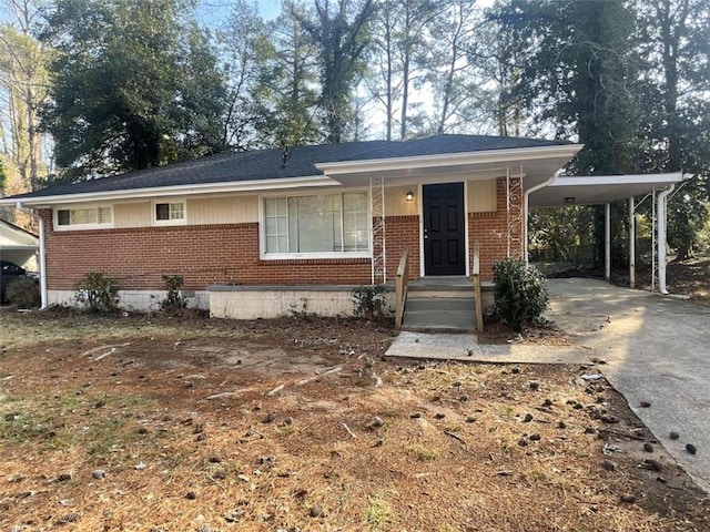 view of front of house with a carport