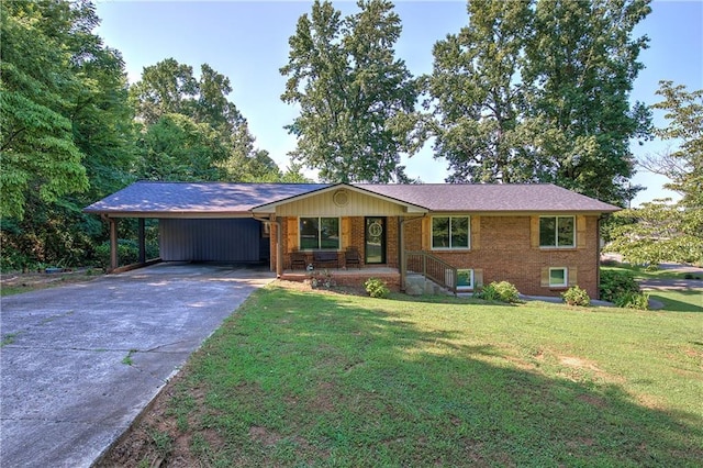 ranch-style house featuring a carport and a front lawn