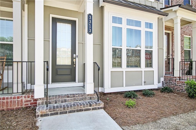 3313 Park Pointe Cir, Scottdale, GA 30079 - property entrance featuring a standing seam roof, covered porch, and metal roof