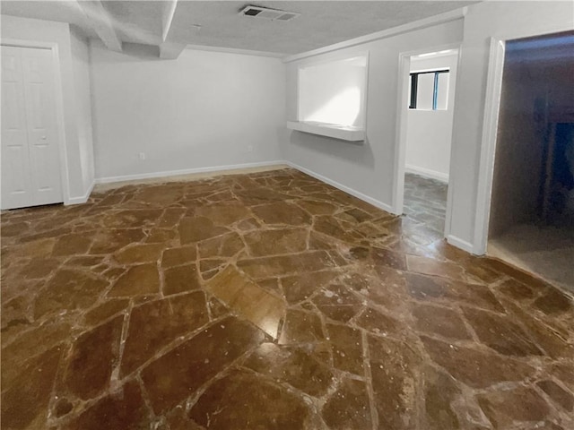 basement with a textured ceiling