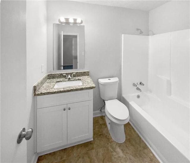 full bathroom with washtub / shower combination, vanity, and toilet