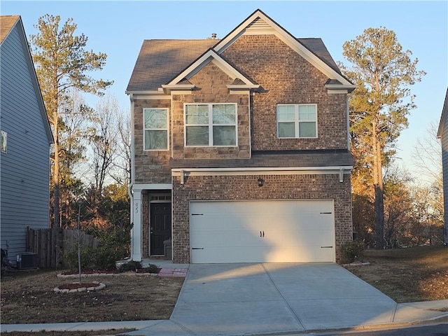 view of front of property featuring central AC and a garage