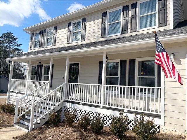 country-style home with covered porch