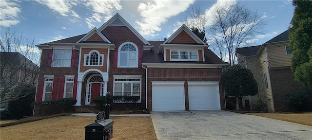 view of front of house with brick siding, concrete driveway, and a front yard