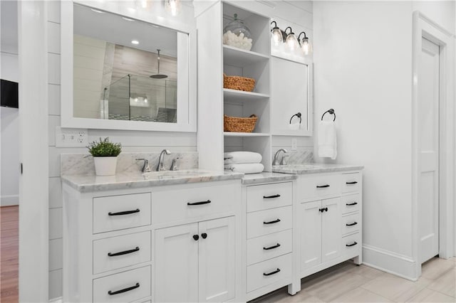 bar featuring a sink and baseboards