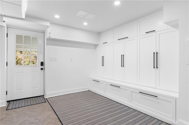 mudroom featuring baseboards and recessed lighting