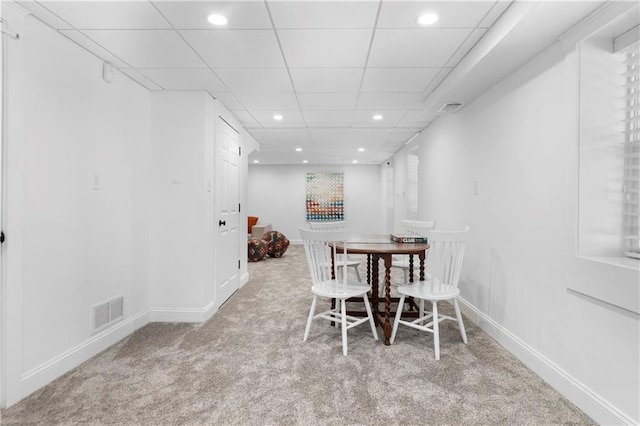 dining space featuring light carpet, baseboards, visible vents, and recessed lighting