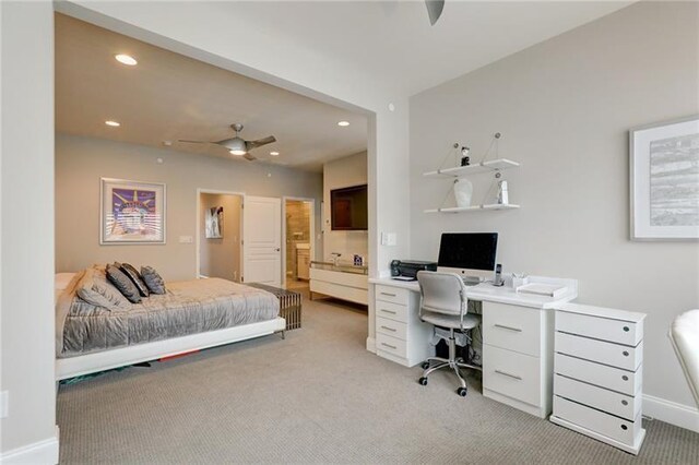 bedroom featuring light carpet, baseboards, connected bathroom, and recessed lighting