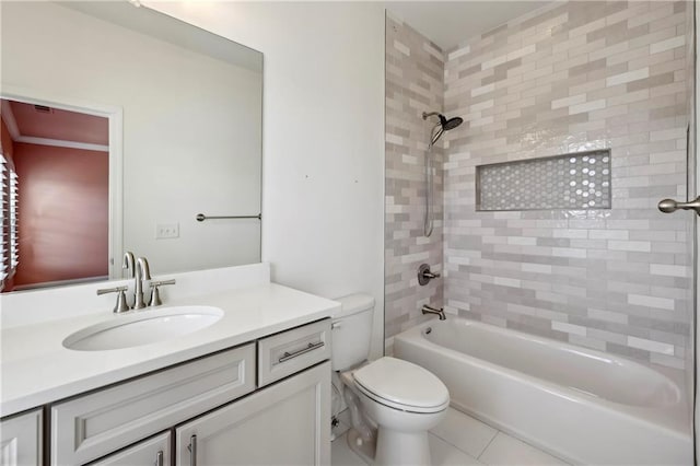 full bathroom featuring toilet, tile patterned floors, washtub / shower combination, and vanity