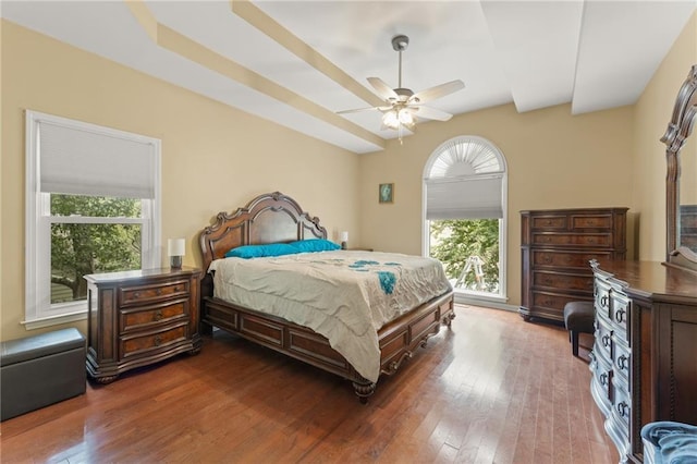 bedroom with dark wood-type flooring and ceiling fan