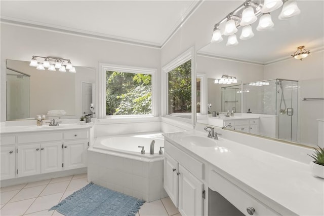 bathroom featuring tile patterned flooring, vanity, crown molding, and plus walk in shower