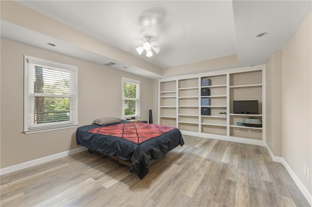 bedroom with light hardwood / wood-style flooring