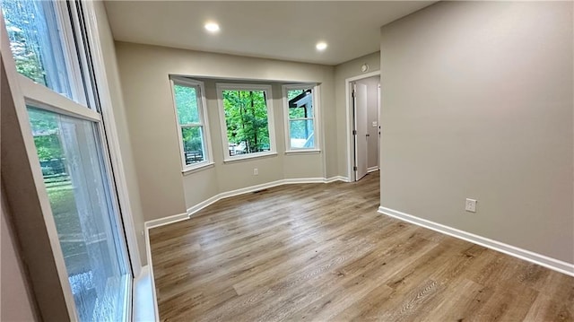 336 Shady Lane Cir, Canton, GA 30115 - unfurnished room with baseboards, wood finished floors, and recessed lighting
