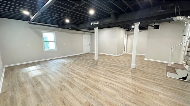 336 Shady Lane Cir, Canton, GA 30115 - below grade area with baseboards, wood finished floors, and stairway