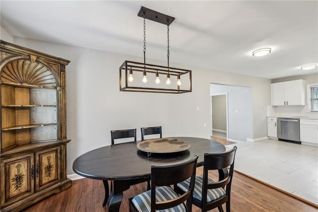 dining room with light wood-type flooring