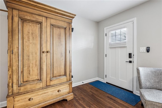 interior space with dark hardwood / wood-style flooring