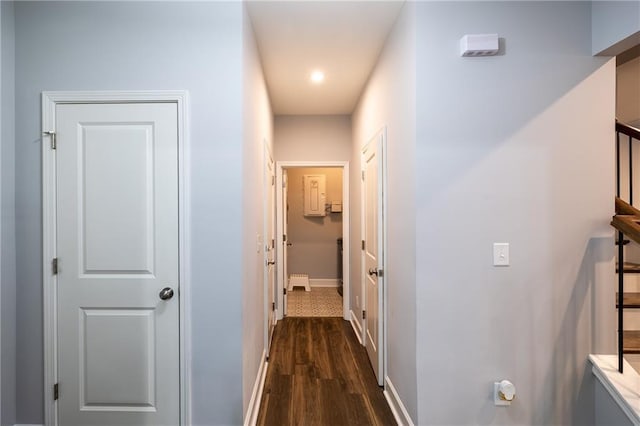 5440 Wheeler Ridge Rd, Auburn, GA 30011 - hallway featuring dark wood-style floors, baseboards, and recessed lighting