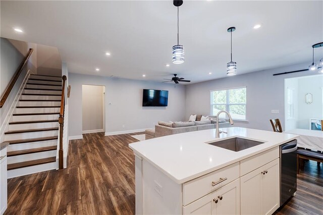 5440 Wheeler Ridge Rd, Auburn, GA 30011 - kitchen featuring a sink, open floor plan, dark wood finished floors, and recessed lighting