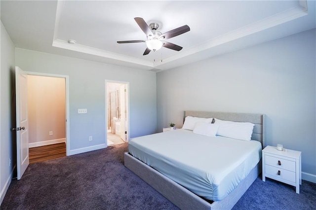 5440 Wheeler Ridge Rd, Auburn, GA 30011 - carpeted bedroom with a raised ceiling, baseboards, ornamental molding, ceiling fan, and connected bathroom