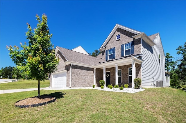 5440 Wheeler Ridge Rd, Auburn, GA 30011 - view of front of property featuring central air condition unit, brick siding, a front lawn, a garage, and driveway