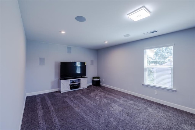 5440 Wheeler Ridge Rd, Auburn, GA 30011 - unfurnished living room featuring dark colored carpet, baseboards, and recessed lighting