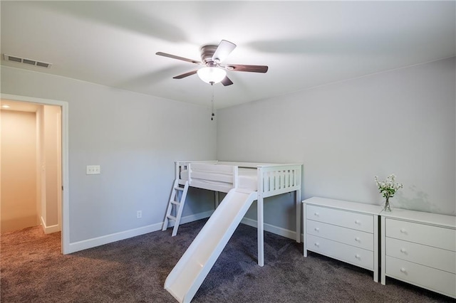 5440 Wheeler Ridge Rd, Auburn, GA 30011 - bedroom featuring dark carpet, baseboards, and a ceiling fan