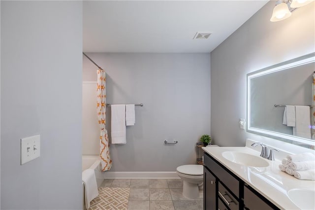 5440 Wheeler Ridge Rd, Auburn, GA 30011 - full bath with toilet, double vanity, shower / bath combo, and baseboards