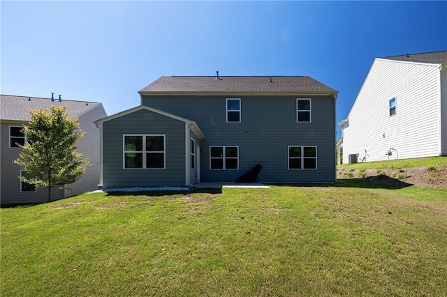 5440 Wheeler Ridge Rd, Auburn, GA 30011 - rear view of property featuring a patio, a lawn, and central AC unit