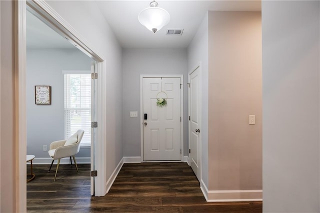 5440 Wheeler Ridge Rd, Auburn, GA 30011 - foyer entrance with dark wood-style flooring and baseboards