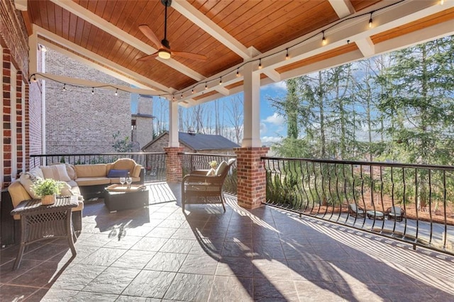 view of patio / terrace with ceiling fan, outdoor lounge area, and a balcony