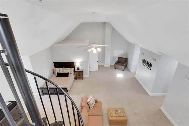 interior space with lofted ceiling, baseboards, and carpet