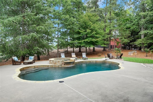 view of swimming pool with a pool with connected hot tub and a patio