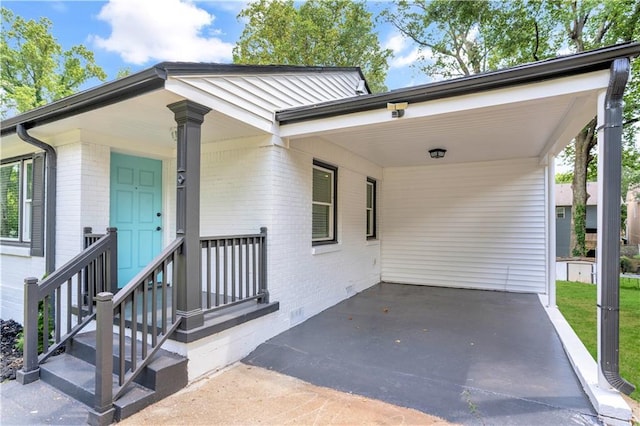 exterior space with a carport