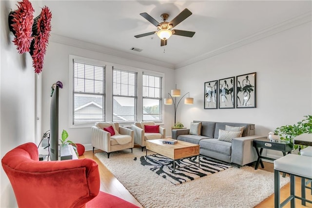 3621 Vinings Slope SE Unit 1537, Atlanta, GA 30339 - living room featuring ceiling fan, ornamental molding, wood finished floors, and baseboards