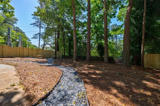 view of yard featuring fence