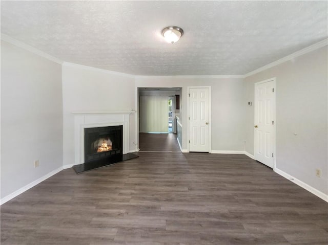 unfurnished living room with a textured ceiling, ornamental molding, and dark hardwood / wood-style flooring