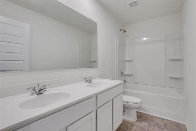 full bathroom featuring vanity, toilet, and shower / bath combination