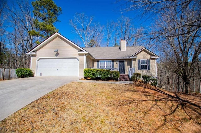 single story home with a garage, concrete driveway, a chimney, and fence