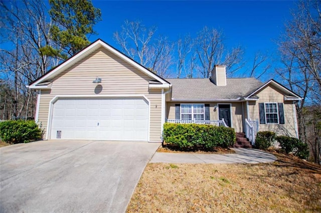 ranch-style house featuring an attached garage, driveway, and a chimney