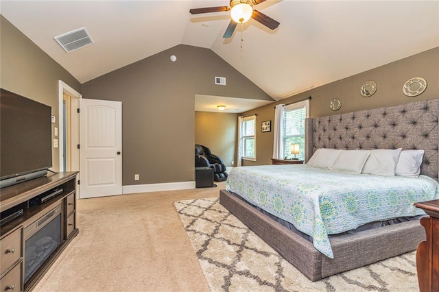 139 Village Park Dr, Newnan, GA 30265 - bedroom featuring light colored carpet, vaulted ceiling, and a ceiling fan