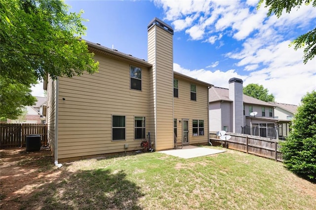 139 Village Park Dr, Newnan, GA 30265 - rear view of property featuring a patio area, a fenced backyard, and a chimney