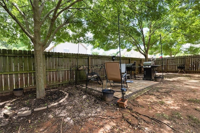 139 Village Park Dr, Newnan, GA 30265 - fenced backyard featuring a patio