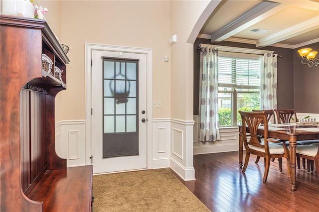 139 Village Park Dr, Newnan, GA 30265 - entryway with crown molding, hardwood / wood-style floors, arched walkways, wainscoting, and a chandelier