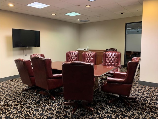 carpeted dining room featuring recessed lighting, a paneled ceiling, and baseboards