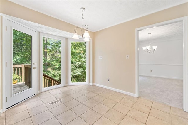 786 Mitsy Pt, Marietta, GA 30068 - unfurnished room featuring a chandelier, light tile patterned floors, a textured ceiling, ornamental molding, and light colored carpet