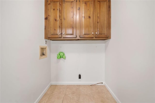 786 Mitsy Pt, Marietta, GA 30068 - washroom featuring cabinet space, washer hookup, and light tile patterned floors