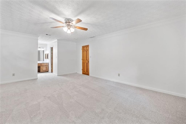 786 Mitsy Pt, Marietta, GA 30068 - spare room with a ceiling fan, light colored carpet, ornamental molding, and a textured ceiling