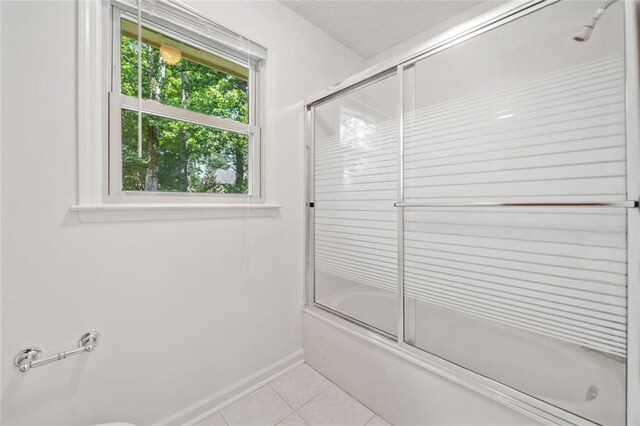 786 Mitsy Pt, Marietta, GA 30068 - bathroom featuring bath / shower combo with glass door and tile patterned flooring
